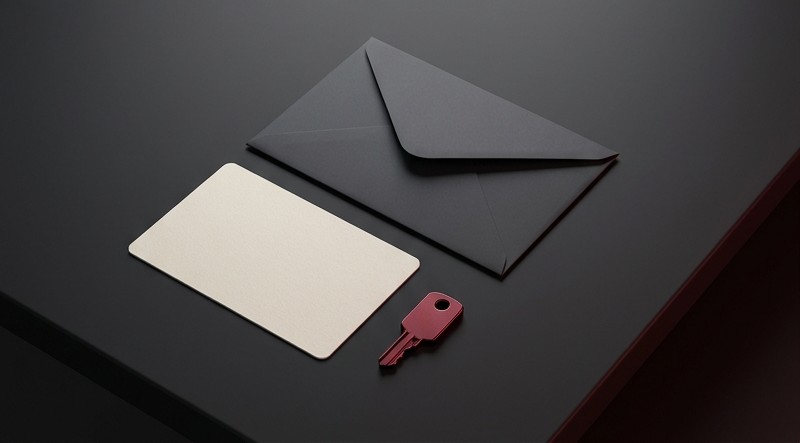 Conceptual AI illustration: A sealed envelope, blank recovery card, and red key.